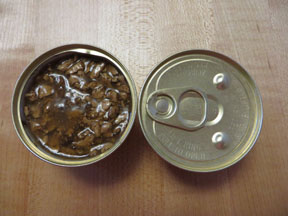 Canned cat food on a table