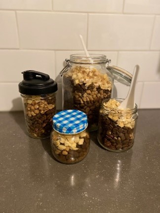 Jars holding various dog treats
